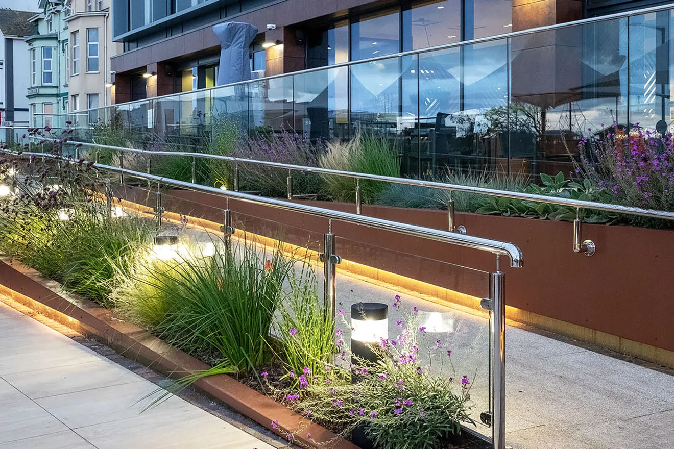 Bespoke Ramp Bespoke Illuminated Ramp and Planter Cladding | Architectural Metalwork ...